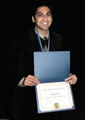 Chirag Vora, MS, receiving his 2009 ACR REF/Abbott Medical Student Clinical Preceptorship certificate at the ACR/ARHP Annual Scientific Meeting.