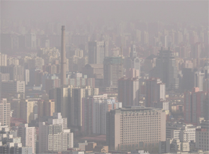 The effects of pollution (such as that shown here in Beijing, China) do not appear until later in the RA disease process.