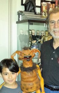 Local kids often come by Dr. Katler’s office for a tour and to get their photo taken. This neighbor is holding a puppet of Salacious Crumb, featured with Jabba the Hutt in Episode 5.
