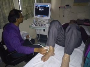Dr. Bhatt performs a bedside musculoskeletal ultrasound.