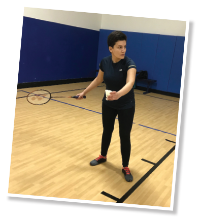 Dr. Sara Alehashemi practices her serves at the local gym.