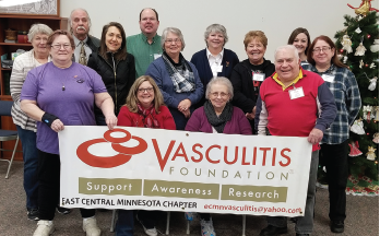 Kami Schmidt (seated at lower left) with the East Central Minnesota Vasculitis Support Group in Minnesota.