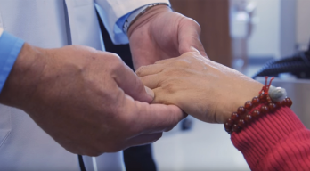 Norman Gaylis, MD, examines a patient at his practice in Aventura, Fla.