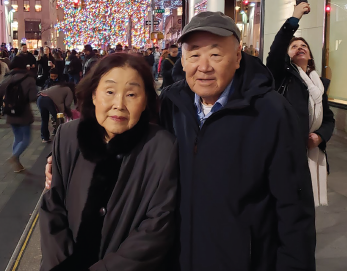 Hae Ja Yoon and Kyung Hwa Seo, the author’s parents, at Rockefeller Center, Christmas 2019.