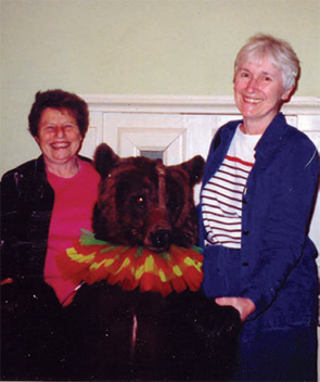 Dr. Lorig and Jean Goeppinger pose with a Russian bear.