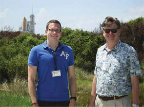 Henry J. Donahue, PhD (right), and Shane Lloyd, an MD/PhD student who worked on the Penn State bone marrow research study, in front of the space shuttle launch pad.