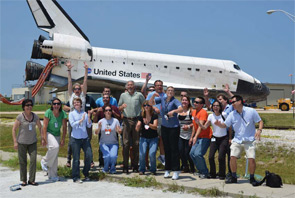 The tissue-collection team members from UNC, the University of Colorado, Amgen, Harvard University, and the Cleveland Clinic celebrate the successful landing of the space shuttle Atlantis.