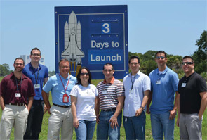 The UNC team counts down the days until Atlantis launches. From left to right: Jeffrey Willey, Shane Lloyd, Ted Bateman, Laura Bowman, Michael Lemus, Anthony Lau, Eric Livingston, and Travis Pruitt.