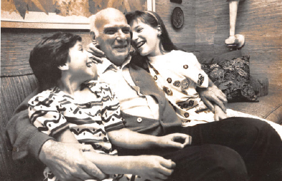 Dr. Edward Rosenbaum with his two granddaughters, Lisa (left) and Jennifer (right).