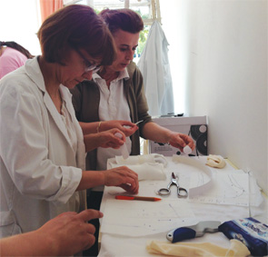 Therapists in a clinic in Skopje learning how to fabricate wrist orthoses.