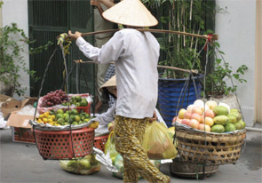 A street vendor with bamboo baskets.