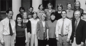 Dr. Liang (at left) with one of his research teams.