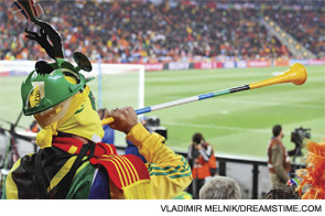 A sports fan supporting his soccer team (or perhaps his Rheumatology World Cup team).