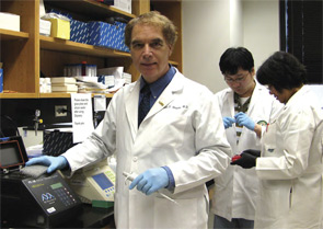 Dr. Mountz (foreground) and colleagues in the University of Alabama research laboratory.