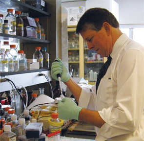 Dr. Rigby in his laboratory.