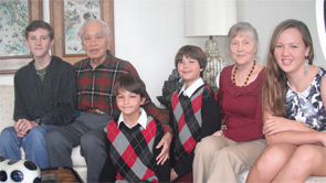 Dr. Tan, his wife Lisa, and their four grandchildren in December 2010.