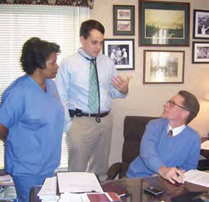 Left to right: Christine M. Mitchell, LPN, Smith, and Dr. McMillan.