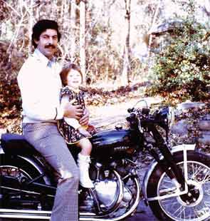 Dr. Rochmis and his daughter on a Vincent motorcycle.