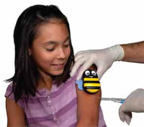 A child receives an injection while using Buzzy.