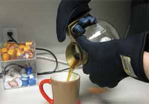 These electronic gloves simulate arthritis’s effects on simple tasks, like pouring coffee.