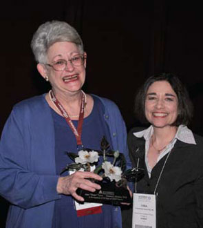 Tyree (left) accepts an Honorary lifetime aRHP membership from Linda Ehrlich-Jones, Phd, Rn, the 2009-2010 aRHP president.