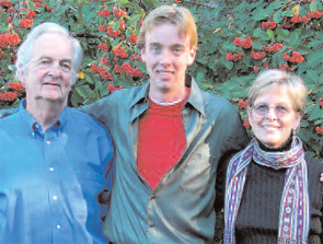 The Holman family gathers together for a Christmas photo.