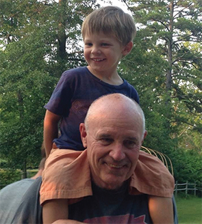 Dr. Atkinson with his grandson, Jack.